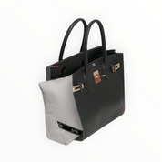 Bag-a-Vie herringbone purse shaper pillow inside a black leather Birkin 30 handbag for shape preservation