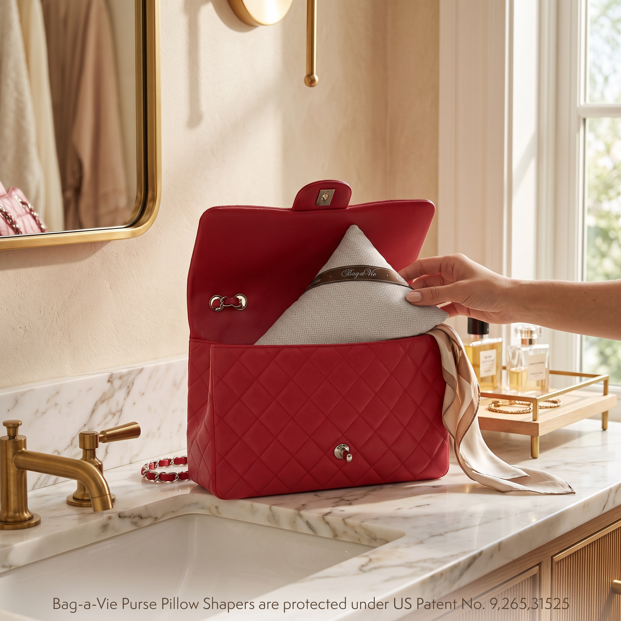 Bag-a-Vie herringbone petite handbag shaper pillow being placed inside a red quilted luxury purse on a marble vanity.