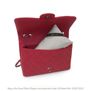 Bag-a-Vie classic petite herringbone handbag shaper pillow inside a red quilted designer purse for shape retention