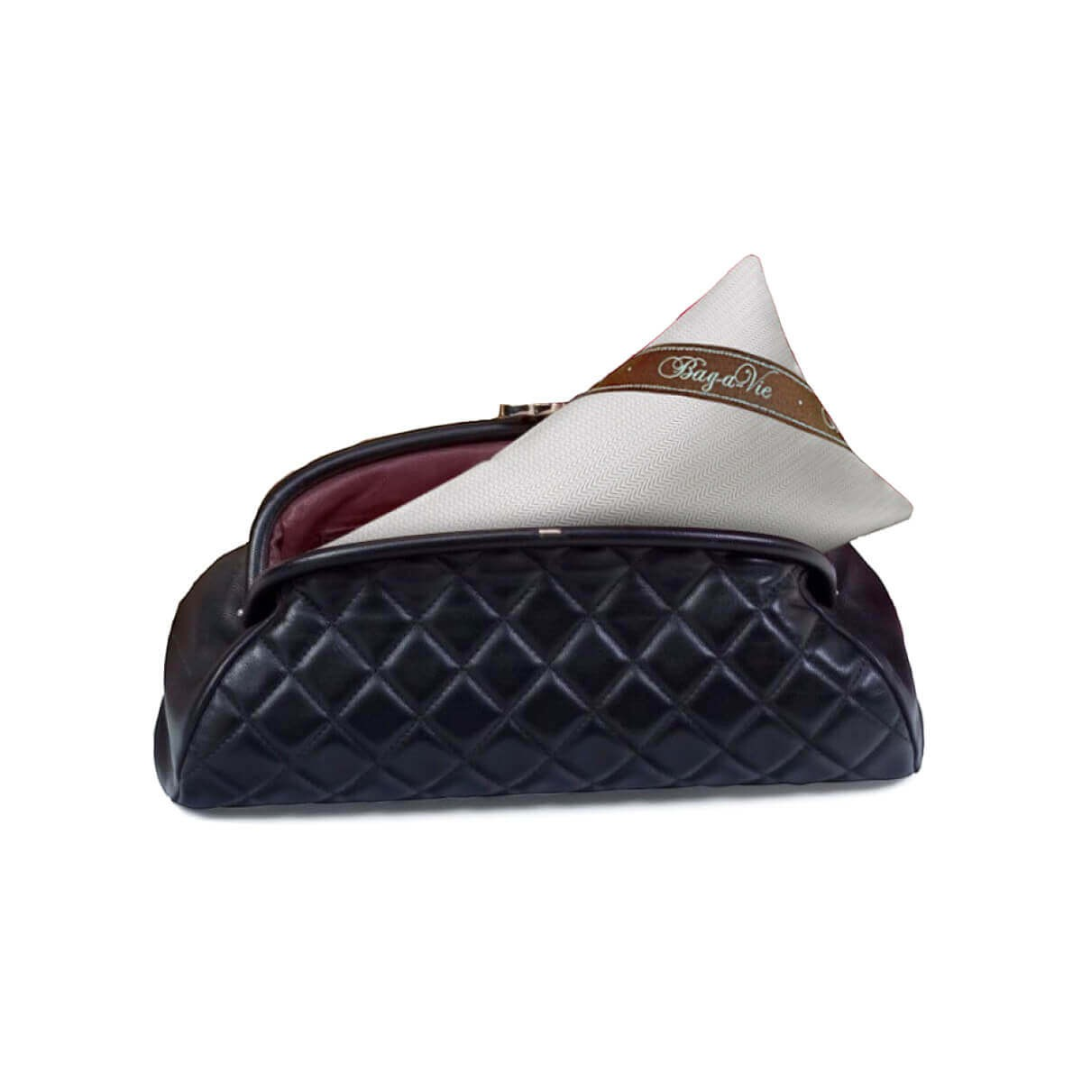 Bag-a-Vie classic mini handbag storage pillow shaper inside a black quilted purse to maintain shape and absorb moisture