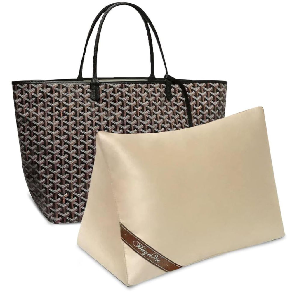 Bag-a-Vie beige purse shaper pillow insert inside a patterned designer tote bag for shape retention and storage.