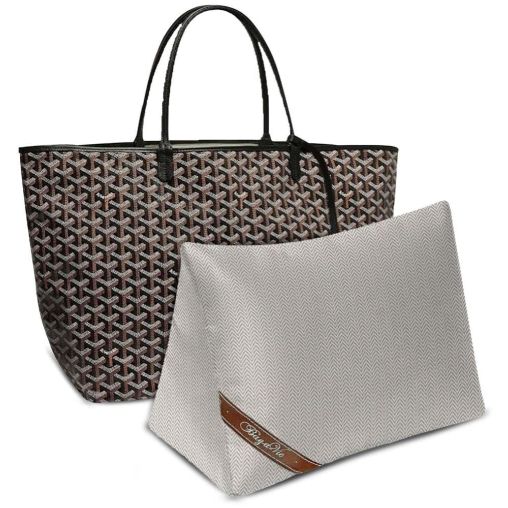 Bag-a-Vie purse shaper pillow in grey herringbone fabric placed in front of a patterned designer tote bag