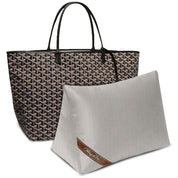 Bag-a-Vie purse shaper pillow in grey herringbone fabric placed in front of a patterned designer tote bag